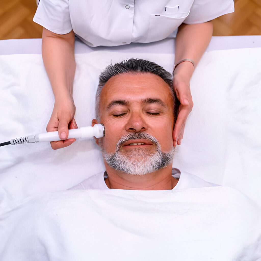 A close-up of a person receiving a medical facial in Delhi in a spa setting.